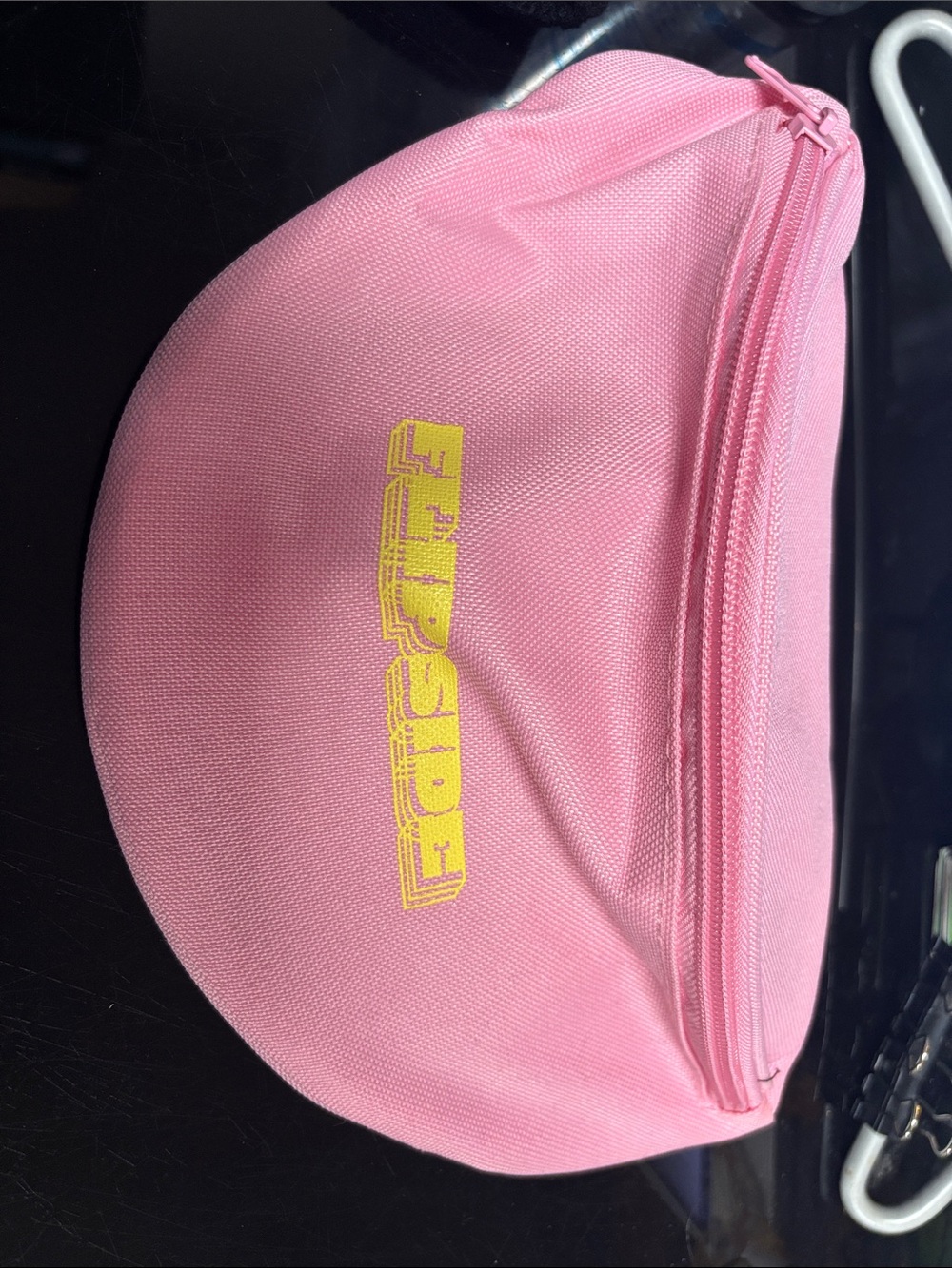 Pink fanny pack with Yellow Logo